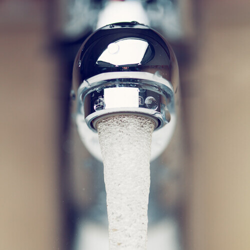 close-up of water coming from a tap